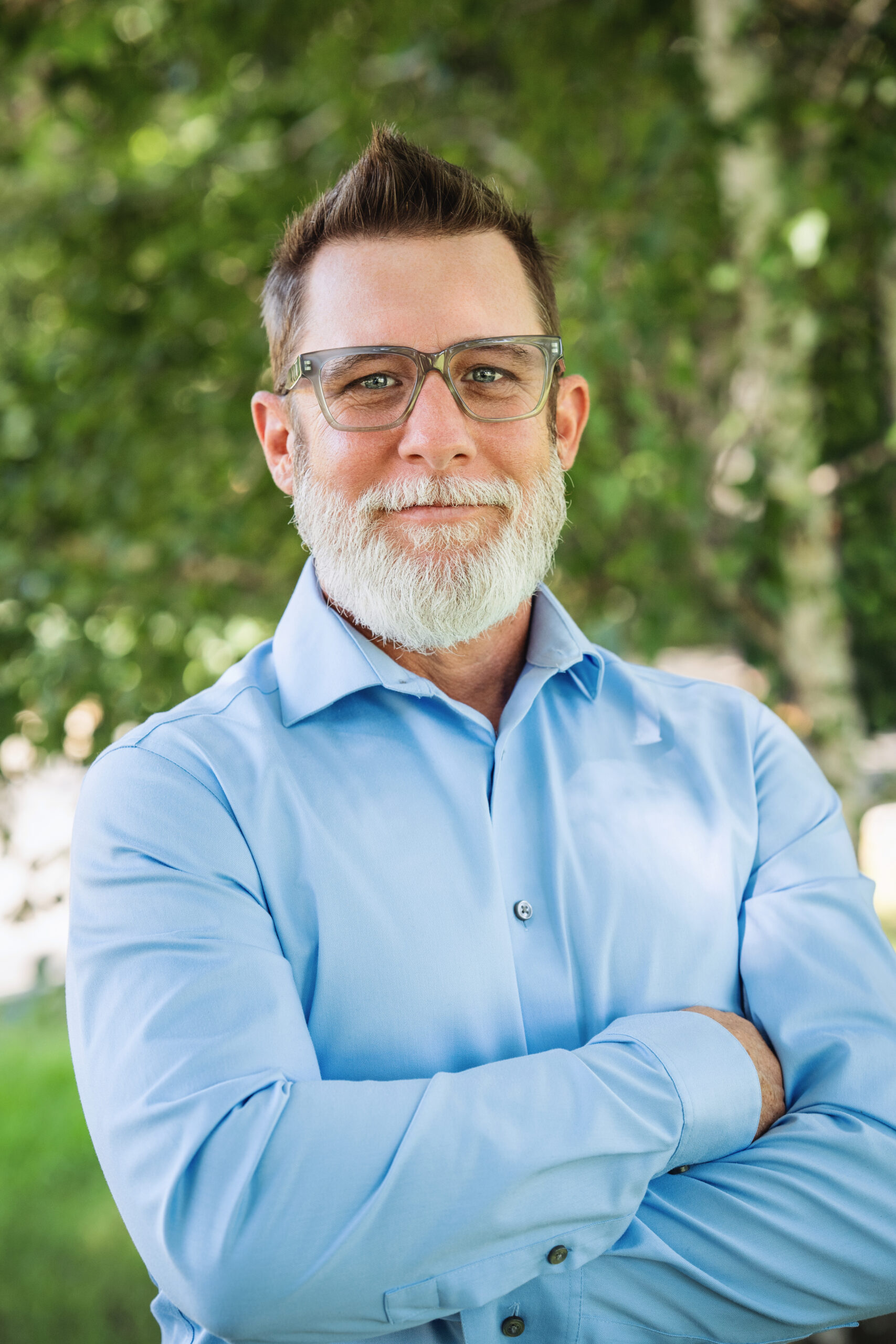 Professional portrait of Adrian Crandall, Senior Sales Executive with Corinthian Title Company